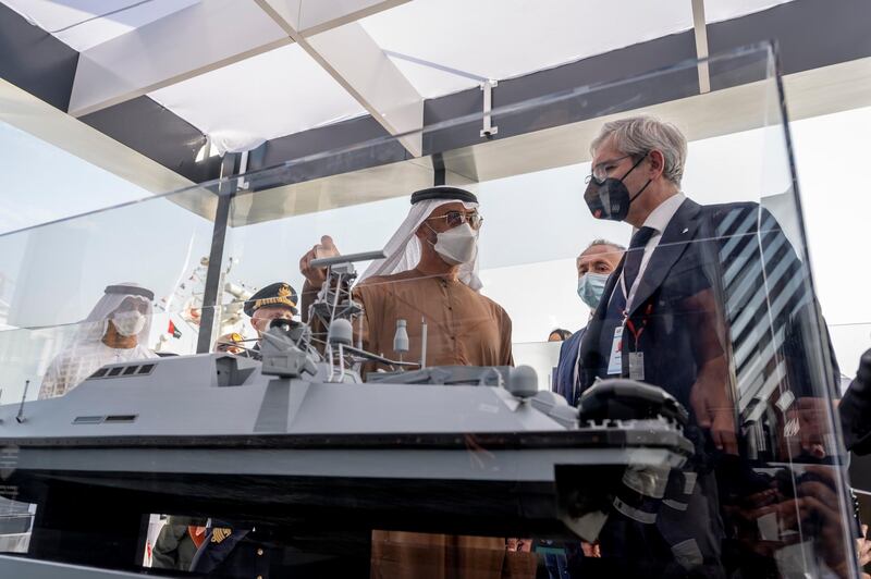 ABU DHABI, UNITED ARAB EMIRATES - February 23, 2021: HH Sheikh Mohamed bin Zayed Al Nahyan, Crown Prince of Abu Dhabi and Deputy Supreme Commander of the UAE Armed Forces (2nd R), tours the 2021 Naval Defence and Maritime Security Exhibition (NAVDEX), at ADNEC. 

( Hamad Al Kaabi / Ministry of Presidential Affairs )​
---