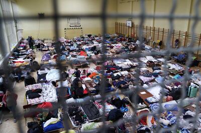 A converted school sports hall in Poland filled with Ukrainian children rescued from orphanages in the Kyiv region. Reuters
