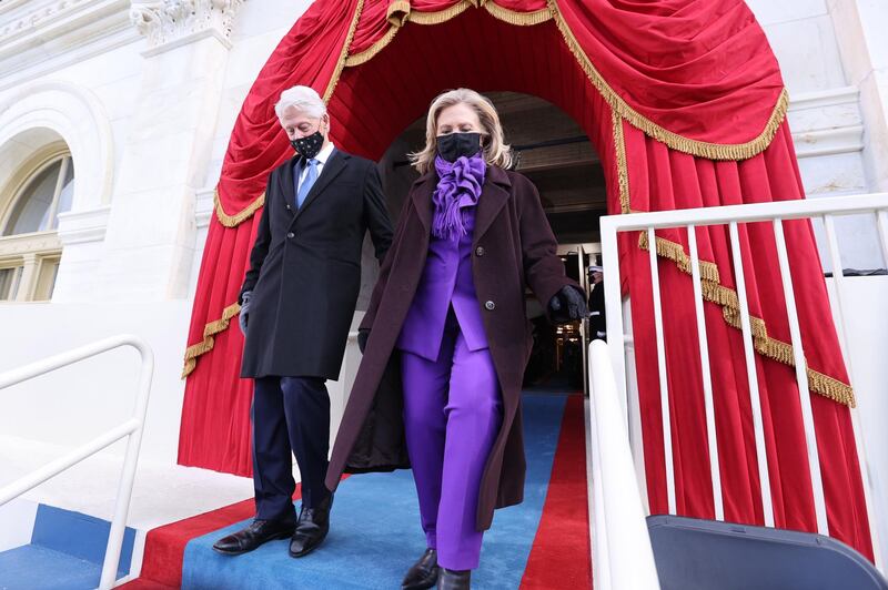 Former president Bill Clinton and former secretary of state Hillary Clinton arrive before the inauguration of Joe Biden. EPA