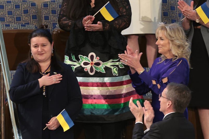 Ukraine's ambassador to the US, Oksana Markarova, acknowledges applause from US first lady Jill Biden as they attend President Joe Biden's first State of the Union address in Washington. AFP