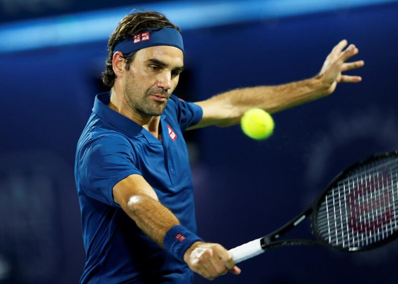 epa07401724 Roger Federer of Switzerland in action against Fernando Verdasco of Spain during their second round match at the Dubai Duty Free Tennis ATP Championships 2019 in Dubai, United Arab Emirates, 27 February 2019.  EPA/ALI HAIDER