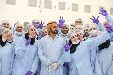 Sheikh Mohammed bin Rashid, Vice President and Ruler of Dubai, with the staff at Mohammed bin Rashid Space Centre. Courtesy: MBRSC 