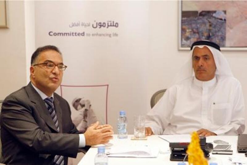 Dubai, United Arab Emirates, Dec 11 2012, Al Ghurair Group, Profile of HE Essa Al Ghurair and Constantin Salameh of Al Ghurair Group, Story by Tom Kane Senior Business Correspondent- (left) HE Essa Al Ghurair and (Right) Constantin Salameh  speaking to the press at their Corp Headquarters, Trans Asia Office, Al Ghurair Centres Office Tower, Deira, Dubai. Mike Young / The National

