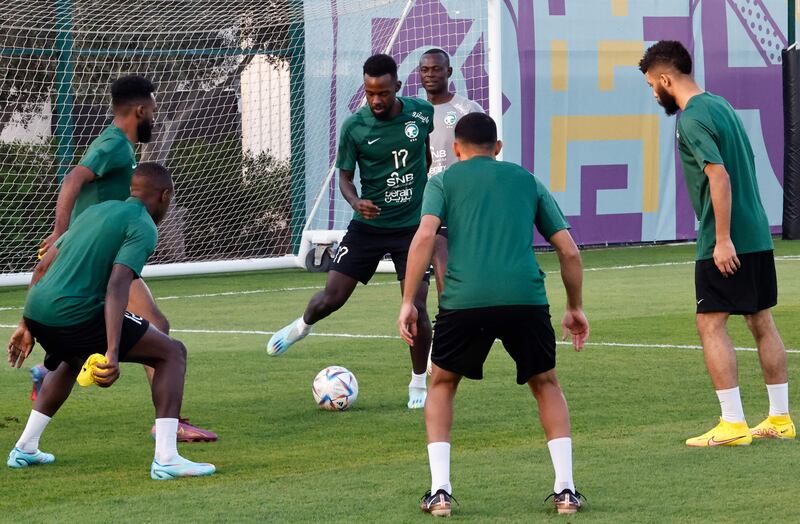 Saudi Arabia defender Hassan Altambakti on the ball during a training session at the Sealine Beach Resort in Doha. AFP