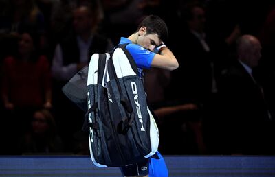 Tennis - ATP Finals - The O2, London, Britain - November 14, 2019   Serbia's Novak Djokovic looks dejected after losing his group stage match against Switzerland's Roger Federer    Action Images via Reuters/Tony O'Brien