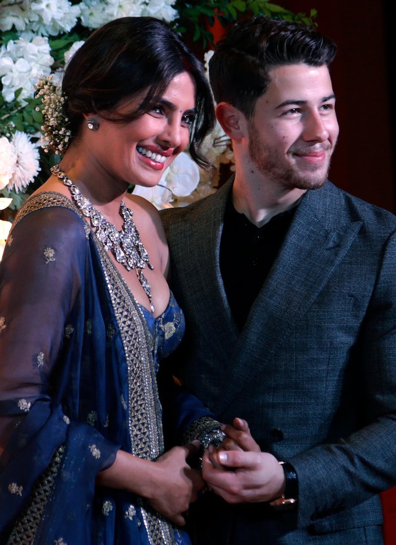 The pair hosted their second wedding reception to thank family and friends for their well wishes (AP Photo/Rajanish Kakade)