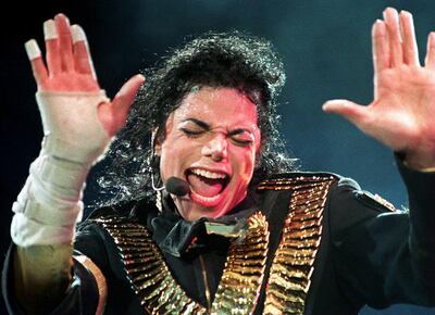 (FILES) In this file photo taken on August 31, 1993, US pop megastar Michael Jackson performs during his "Dangerous" tour in Singapore.   An unflinching new documentary on pedophilia accusations against Michael Jackson shatters the veneer of his larger-than-life celebrity, presenting in stark, lurid detail the stories of two men who say the late King of Pop for years sexually abused them as minors. / AFP / STR
