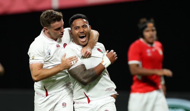 SAPPORO, JAPAN - SEPTEMBER 22:   Manu Tuilagi (R) celebrates with team mate George Ford after scoring his second try during the Rugby World Cup 2019 Group C game between England and Tonga at Sapporo Dome on September 22, 2019 in Sapporo, Hokkaido, Japan. (Photo by David Rogers/Getty Images)