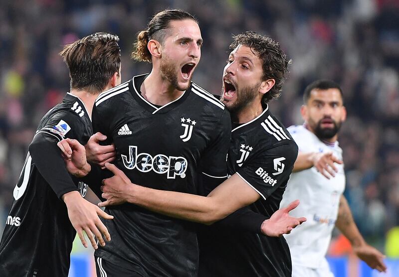 Adrien Rabiot, centre, celebrates after scoring to put Juventus 3-2 ahead against Sampdoria. EPA