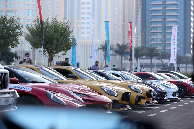 Supercars parked and ready for the parade. Khushnum Bhandari / The National