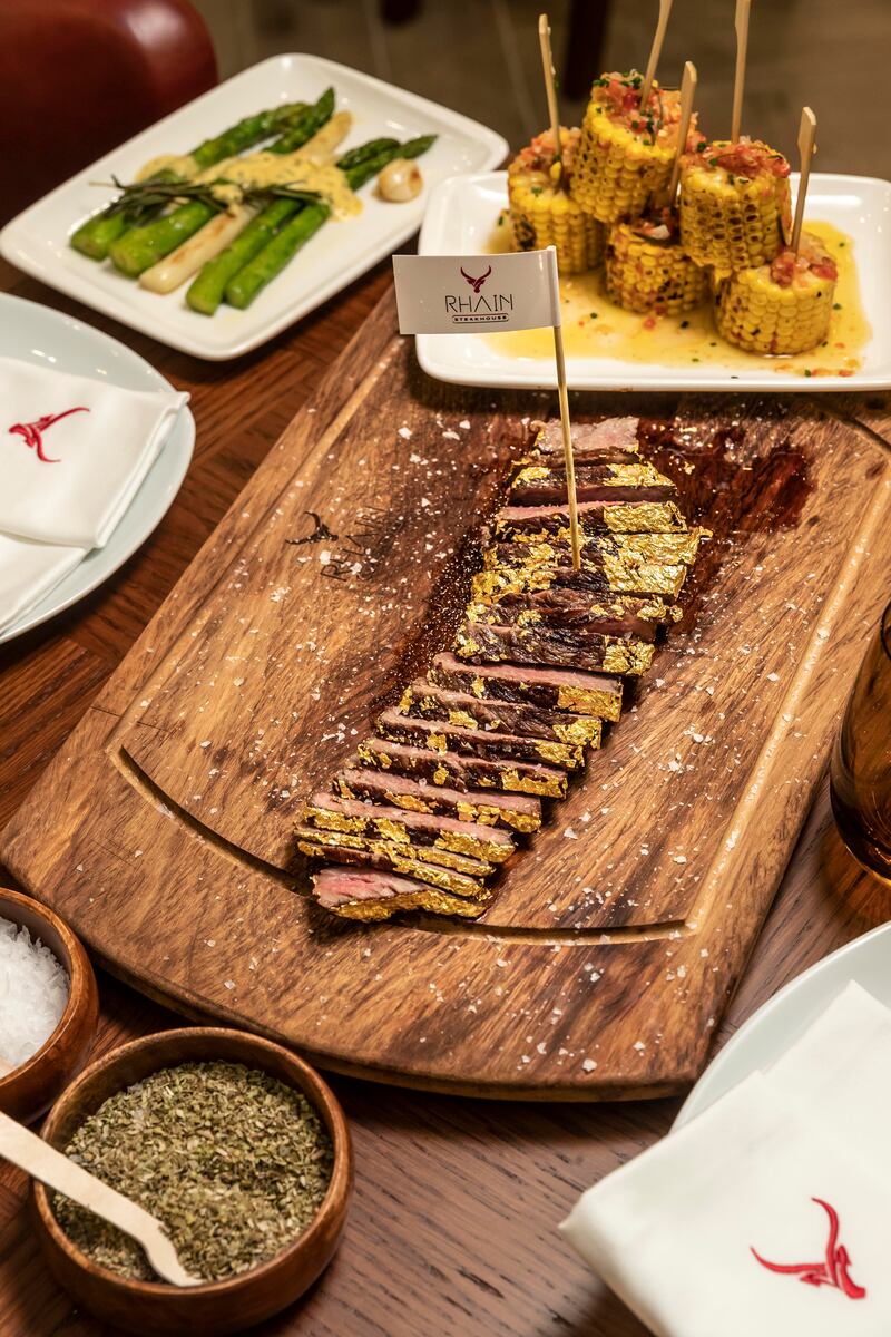 A gold-covered steak from Rhain Steakhouse. Antonie Robertson / The National