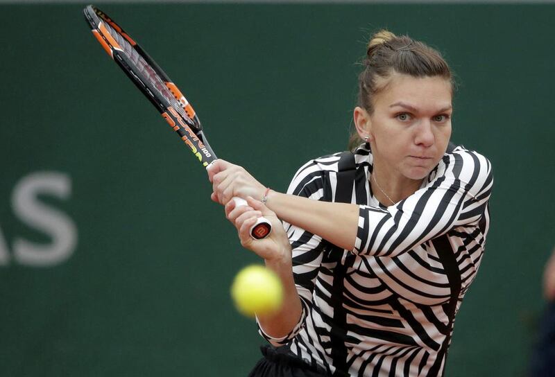 Simona Halep in action against Samantha Stosur. Jacky Naegelen / Reuters