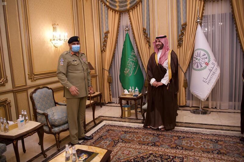 Pakistan's Army Chief of Staff General Qamar Javed Bajwa is welcomed by Saudi Arabia's Deputy Defense Minister Prince Khalid bin Salman, in Riyadh, Saudi Arabia August 17, 2020. Picture taken August 17, 2020. Saudi Press Agency/Handout via REUTERS ATTENTION EDITORS - THIS PICTURE WAS PROVIDED BY A THIRD PARTY.