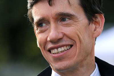 Expelled Conservative MP Rory Stewart walks through the temporary media broadcast centre on College Green, near the Houses of Parliament, in London central London on September 4, 2019. British Prime Minister Boris Johnson lost a crucial parliamentary vote on his Brexit strategy on Tuesday after members of his own Conservative Party voted against him, opening the way for possible early elections. The ruling Conservative party lost its working majority in parliament on Tuesday after one of its MPs switched to the anti-Brexit Liberal Democrats and, a few hours later, it expelled 21 MPs from the party for voting against the government. / AFP / ISABEL INFANTES
