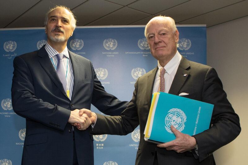 UN envoy Staffan de Mistura (R) and Syrian chief negotiator and Ambassador of the Permanent Representative Mission of Syria to the United Nations Bashar al-Jaafari shake hands before the start of talks on Syria in Vienna on January 25, 2018.
The UN will make a fresh push to jumpstart Syrian peace talks, as violence continues to rage in a seven-year-old war that has killed more than 340,000 people. / AFP PHOTO / ALEX HALADA