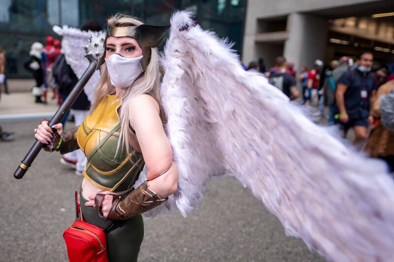 A Hawkgirl cosplayer poses during New York Comic Con. Charles Sykes / Invision / AP