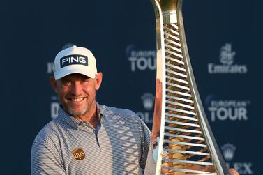  Lee Westwood celebrates with the Race to Dubai Trophy at the DP World Tour Championship at Jumeirah Golf Estates in Dubai last month. Getty