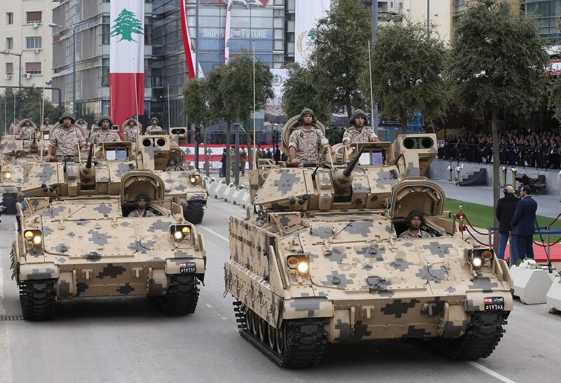 Lebanese soldiers take part in a military parade for Independence Day celebrations marking 74 years since the end of France's mandate in Lebanon, on November 22, 2017 in Beirut.
Lebanon's Prime Minister Saad Hariri said today he had agreed to suspend his decision to resign, at the request of President Michel Aoun, pending talks on the political situation. / AFP PHOTO / ANWAR AMRO