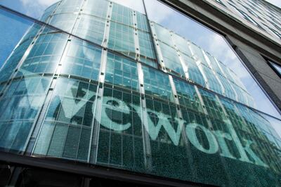 A sign stands in the window of a shared office space, operated by WeWork Cos Inc., in London, U.K., on Monday, Aug. 14, 2017. WeWork Cos Inc. has started legal action against shared-office landlord UrWork in London, accusing its fast-growing Chinese rival of infringing on its trademarks. Photographer: Jason Alden/Bloomberg