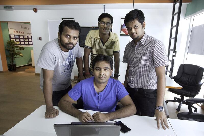 From left: KarmaSnap founders Gautham N, Ram N, Jayana nd UC and Mahboob Imtiyaz, seated, won support from DP World’s Turn8 seed accelerator incubation programme. Jaime Puebla / The National