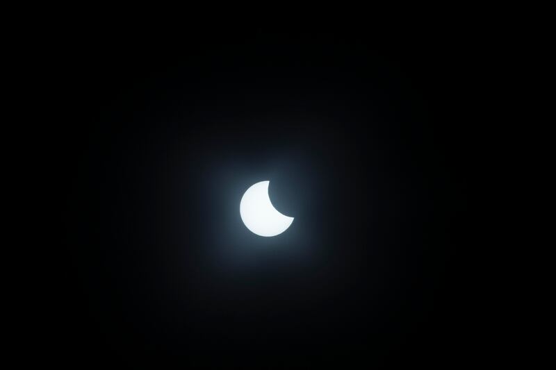 The partial solar eclipse captured from the centre in the Dubai park. All photos: Antonie Robertson / The National

