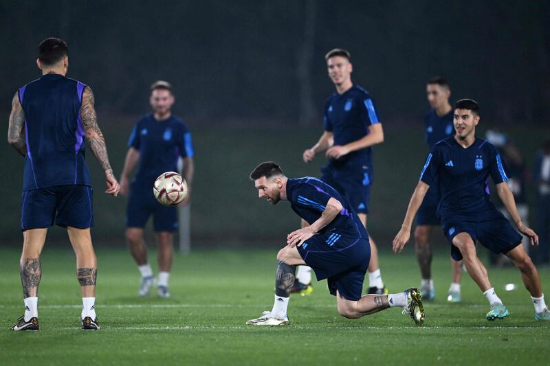 Lionel Messi takes part in a training session at Qatar University. AFP