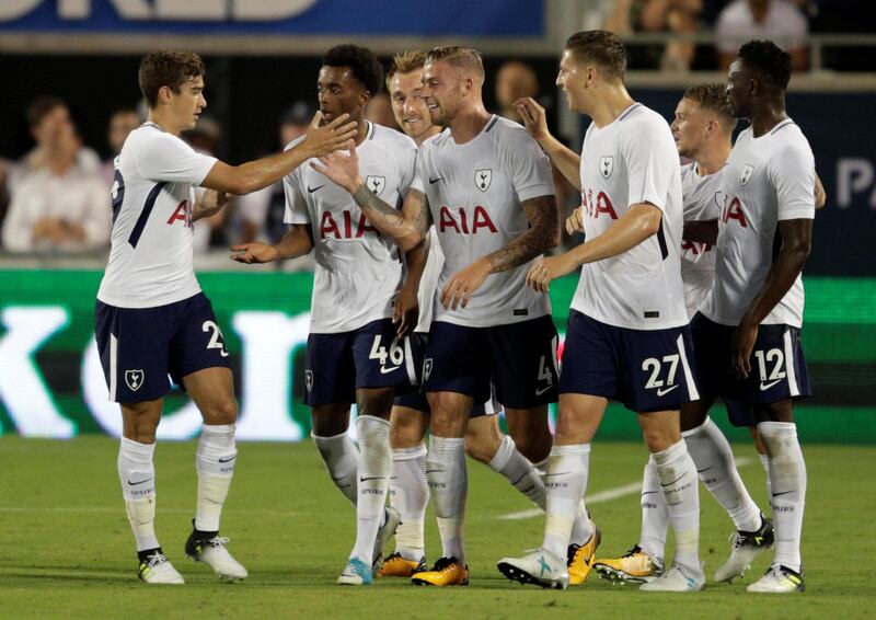 Toby Alderweireld celebrates scoring a goal with his Tottenham Hotspur teammates against Paris Saint-Germain. Kevin Kolczynski / Reuters