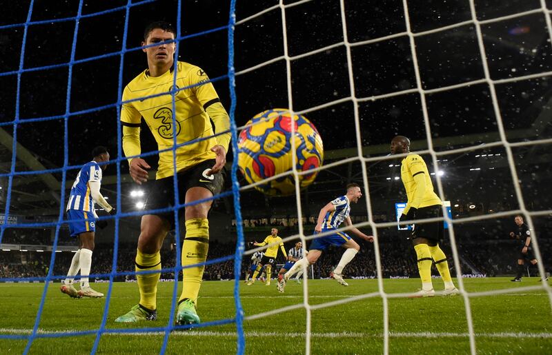 Brighton & Hove Albion's Adam Webster celebrates scoring their first goal as Chelsea's Thiago Silva reacts. Reuters