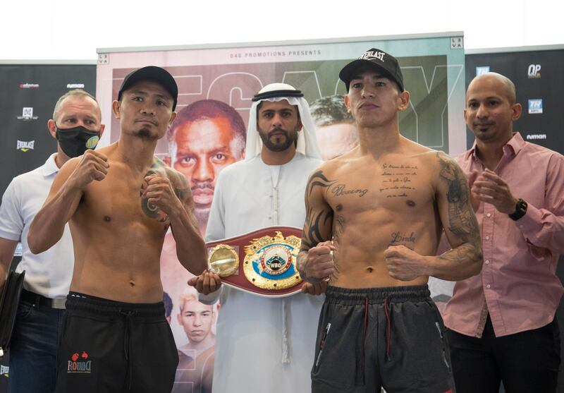 Dubai, United Arab Emirates - Donnie Nietes (Philippines) and  Pablo Corillo (Colombia) at their weigh-in at Leva Hotel, Sheikh Zayed Road.  Leslie Pableo for The National for Amith Pasella's story