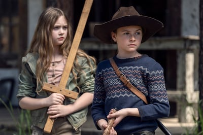 Cailey Fleming as Judith Grimes, right, and Anabelle Holloway as Gracie in 'The Walking Dead'. Josh Stringer / AMC