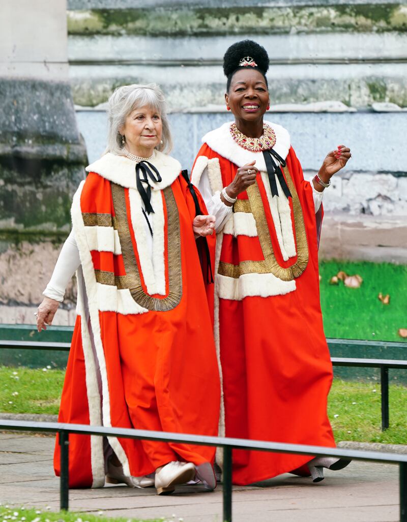 Baroness Floella Benjamin, right, arrives at Westminster Abbey. Getty Images