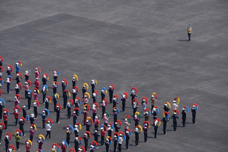 Participants attend a rehearsal understood to be for a 'mass games' performance, in Pyongyang, North Korea. AFP