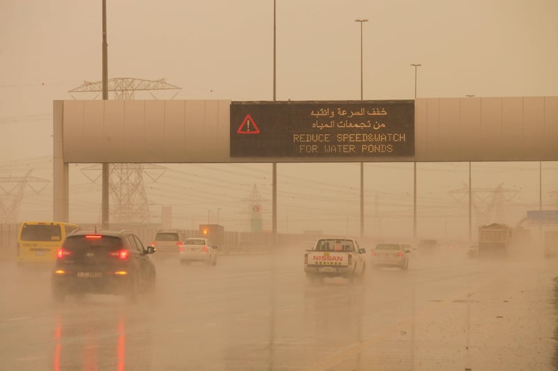 Dubai, United Arab Emirates - April 7 2013 - Digital screens warn motorists to drive carefully through intermittent heavy rains and a sandstorm off Emirates Road.  tags: WEATHER (Razan Alzayani / The National)