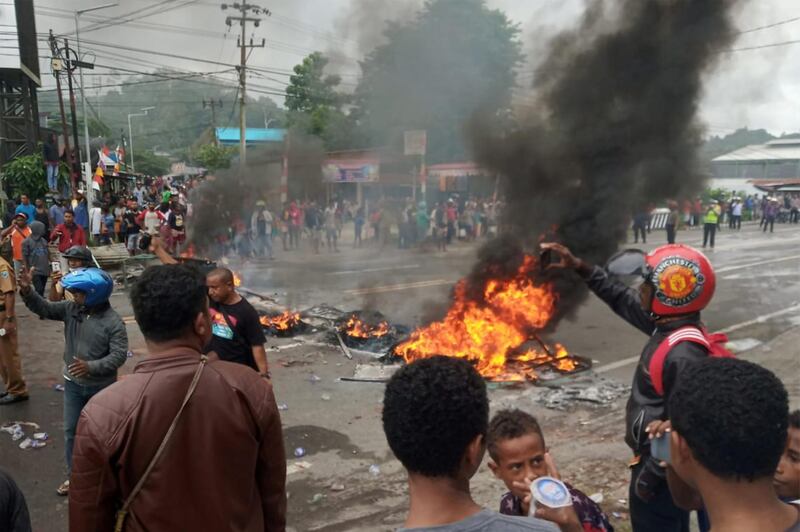 People burn tires during a protest. Reuters