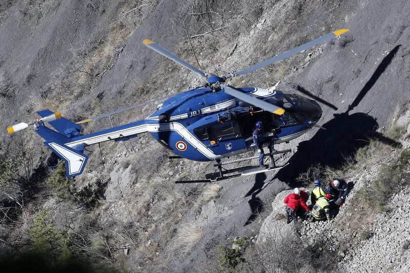 Search workers are deployed by helicopter at the crash site of the Germanwings Airbus A320, to collect debris and find the second black box, above the town of Seyne-les-Alpes, southeastern France on March 29, 2015. Yoan Valat/EPA