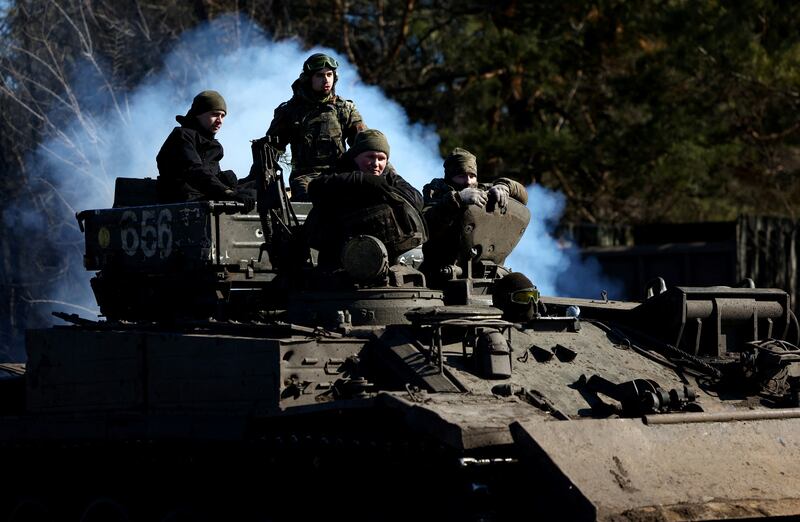 Ukrainian servicemen near the front line in Vuhledar. Reuters