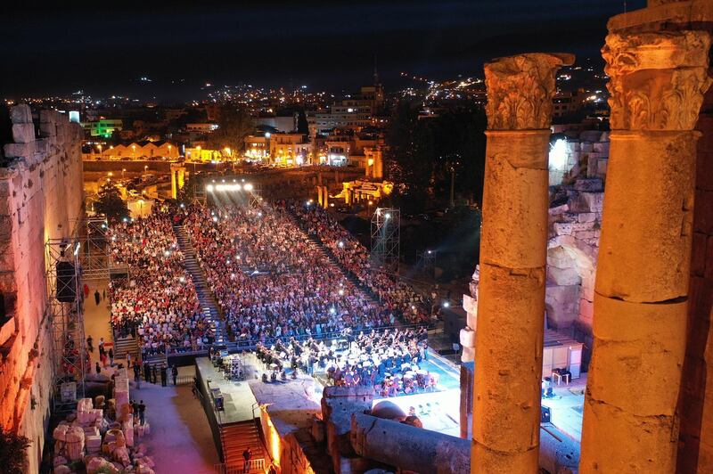 Fans watch Palestinian singer Mohammed Assaf during the annual Baalbeck International Festival (BIF) in Baalbeck, Beqaa Valley, Lebanon, 20 July 2019. The festival runs from 05 July to 03 August 2019.  Photo: EPA