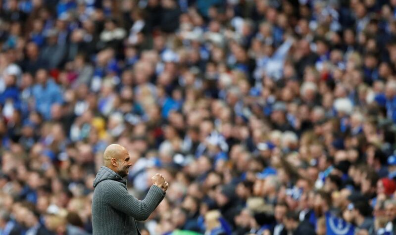 Manchester City manager Pep Guardiola celebrates their first goal. Reuters