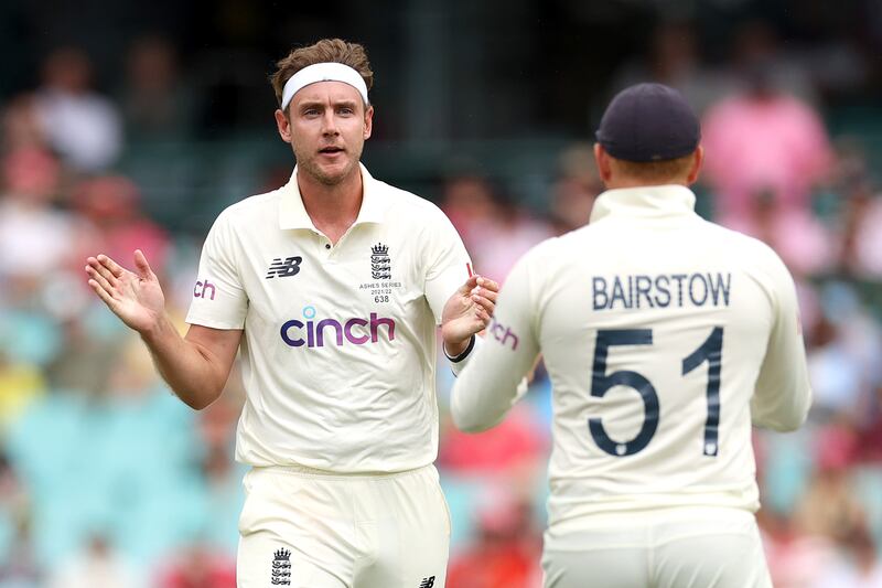 Stuart Broad and Jonathan Bairstow of England celebrate the wicket of David Warner of Australia. Getty Images