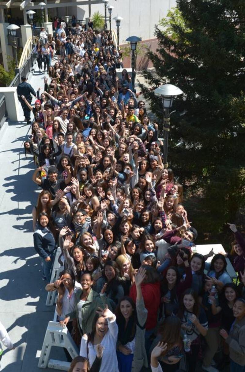 Thousands of fans line up to attend the launch of the Spring '14 Kendall & Kylie Collection. AP