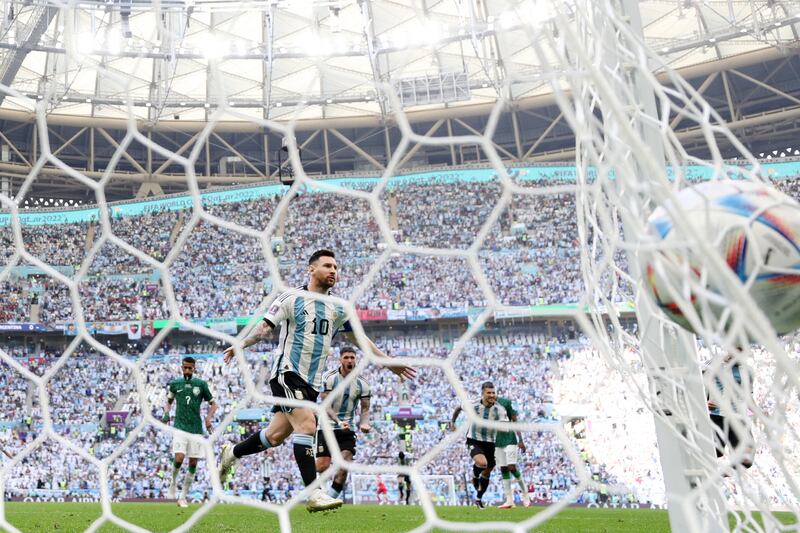Lionel Messi celebrates after opening the scoring with a penalty past Mohammed Al Owais of Saudi Arabia, in the  Fifa World Cup Qatar 2022 Group C match between Argentina and Saudi Arabia at Lusail Stadium in Lusail City, Qatar. Getty Images