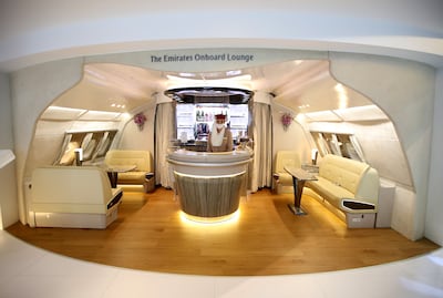 Passengers booking Emirates's premium economy tickets will not get access to the airline's famed onboard bar or shower spas.  EPA / Ali Haider 