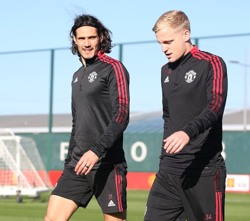 Edinson Cavani and Donny van de Beek of Manchester United in action during a first team training session at Carrington Training Ground.