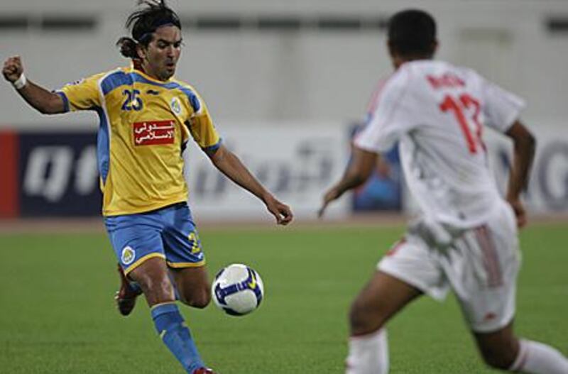 Al Gharafa's Iraqi international Nashat Akram was the star man against Sharjah.