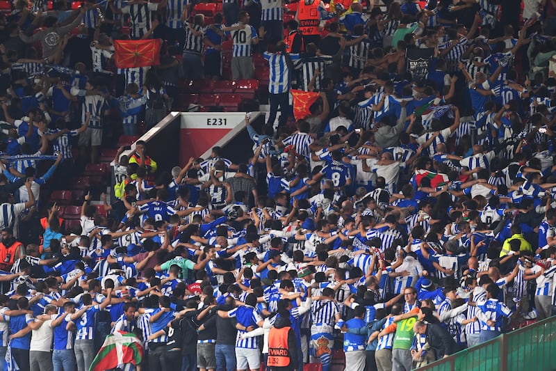 Real Sociedad fans celebrate after their first goal. Getty
