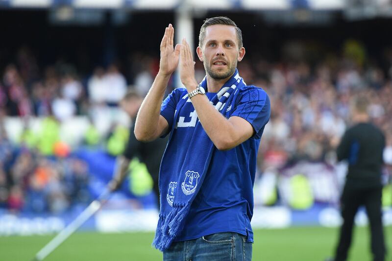 Everton's Icelandic midfielder Gylfi Sigurdsson is introduced to supporters on the pitch ahead of the UEFA Europa League playoff round, first leg football match between Everton and Hajduk Split at Goodison Park in Liverpool, north west England on August 17, 2017. / AFP PHOTO / Oli SCARFF