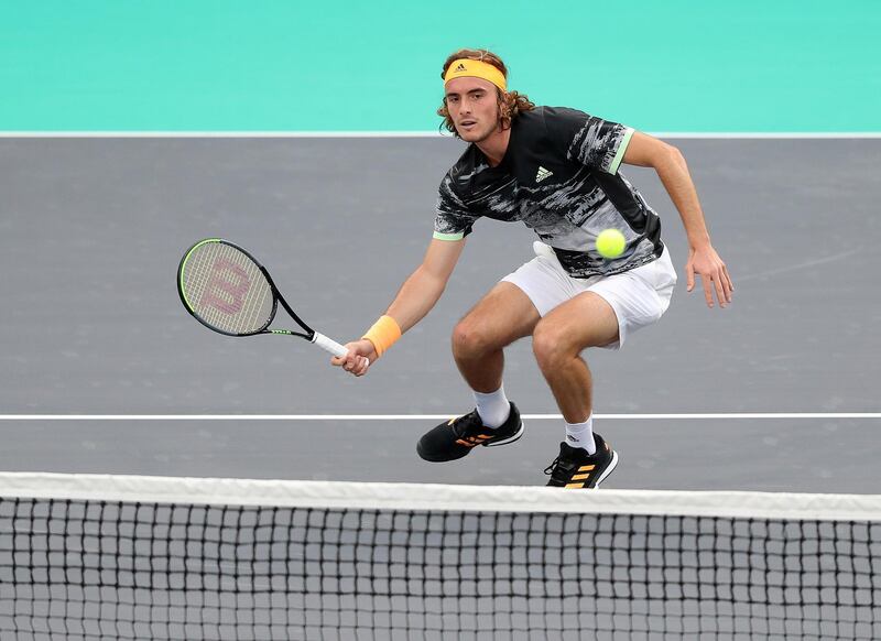 Abu Dhabi, United Arab Emirates - Reporter: Jon Turner: Stefanos Tsitsipas makes a shot during the match between Stefanos Tsitsipas v Andrey Rublev at the Mubadala World Tennis Championship. Thursday, December 19th, 2019. Zayed Sports City, Abu Dhabi. Chris Whiteoak / The National