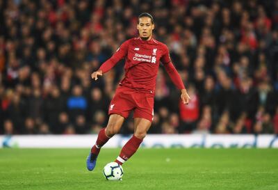 LIVERPOOL, ENGLAND - APRIL 26:  Virgil van Dijk of Liverpool in action during the Premier League match between Liverpool FC and Huddersfield Town at Anfield on April 26, 2019 in Liverpool, United Kingdom. (Photo by Michael Regan/Getty Images)