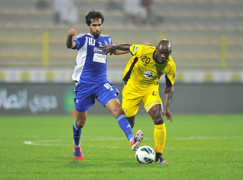 United Arab Emirates - Dubai - Saturday -26/01/2013 -  Al Wasl (yellow) team match with Al Nasr (blue) team within Etisalat league at the Al Wasl Stadium in Dubai. Ashraf Umrah / Al Ittihad