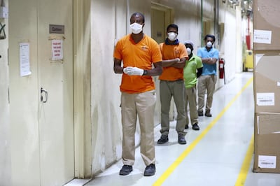 RAK, United Arab Emirates - Reporter: N/A: Labourers are tested for Covid-19 at BMJ industries in Ras Al Khaimah. Tuesday, March 31st, 2020. Ras Al Khaimah. Chris Whiteoak / The National